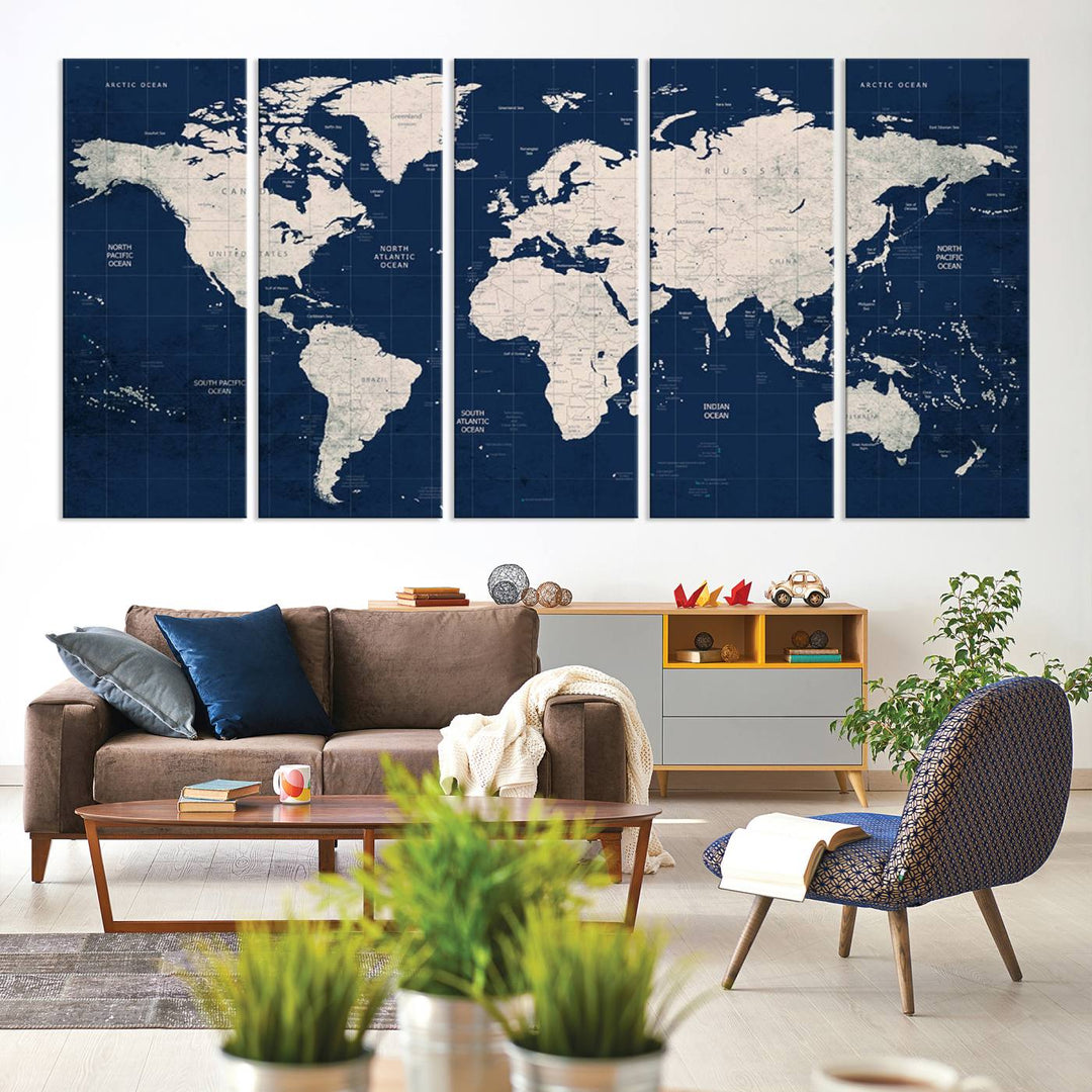 Large modern world map wall art canvas print in beige and navy; showcases a 3-panel vintage map design and is ready to hang.