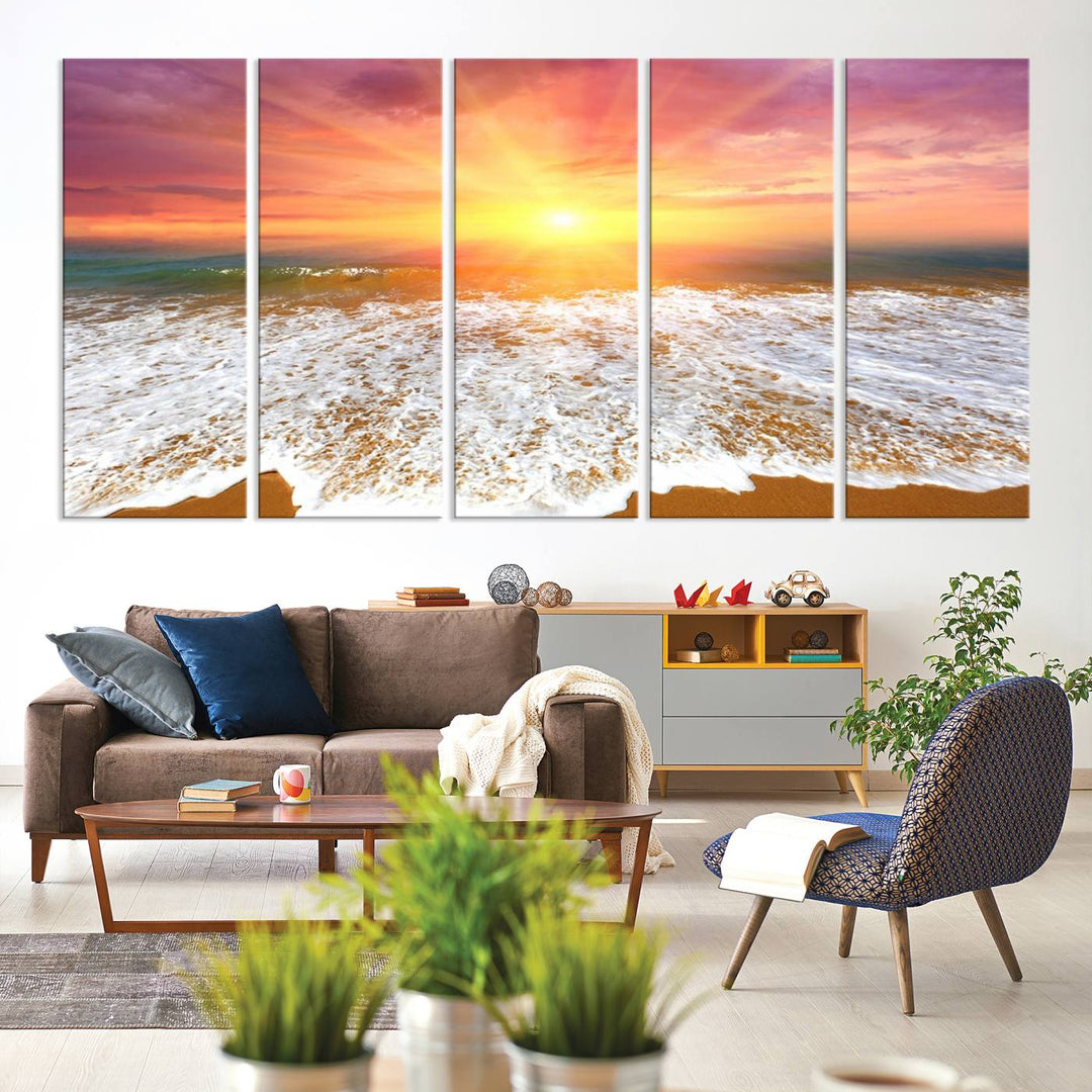 Golden Beach Sunrise 3-panel canvas art of ocean waves, hung on a wooden wall.