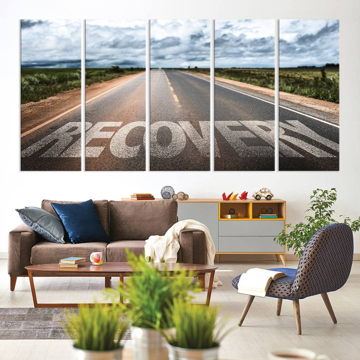 The Recovery Road Wall Art Canvas Print depicts a road under a cloudy horizon.