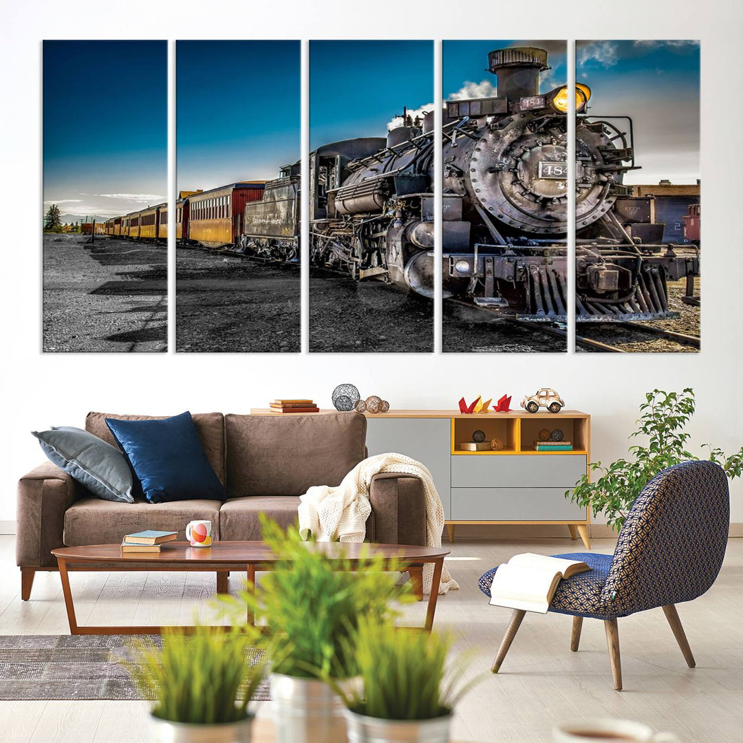 The Train Wall Art Canvas Print features a vintage steam train with a bright headlight.