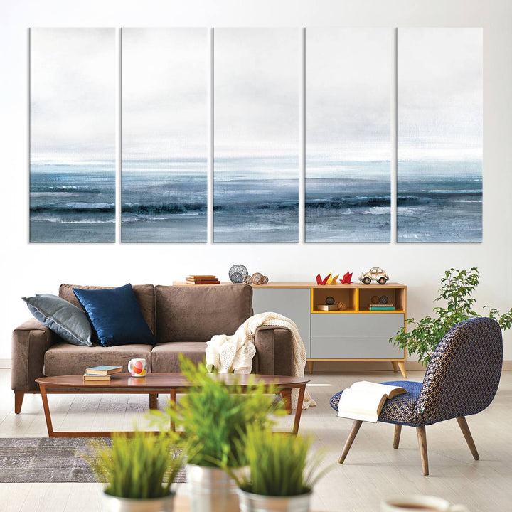 The dining area features Blue Ocean Abstract Artwork on canvas.