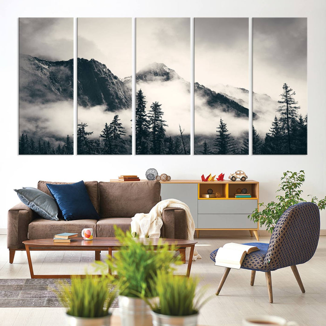 A large foggy mountain forest canvas print hangs prominently in the room.