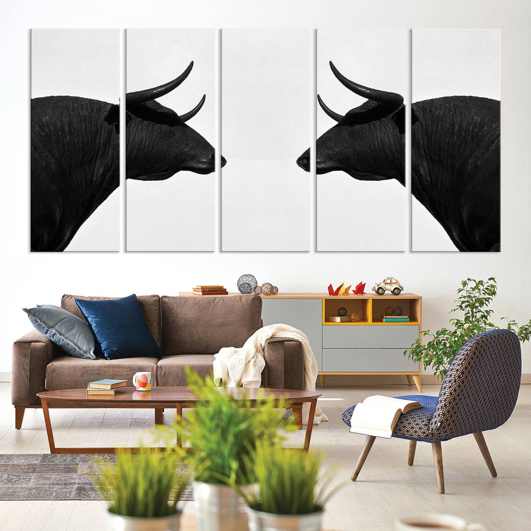 Spanish Bull Wall Art Canvas Print: Two black bull heads facing off on museum-quality canvas.