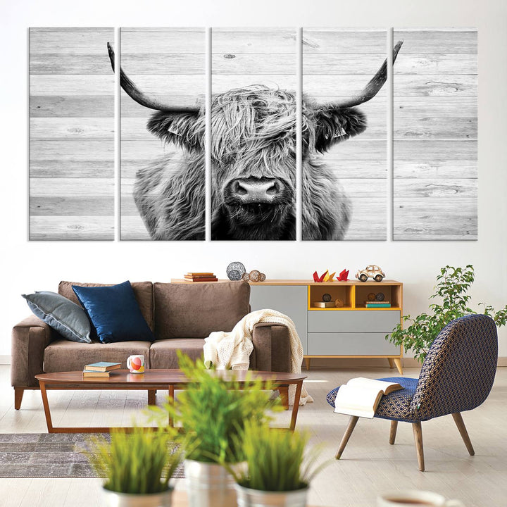 Scottish Highland Cow Cattle Art adds rustic farmhouse charm to the space.