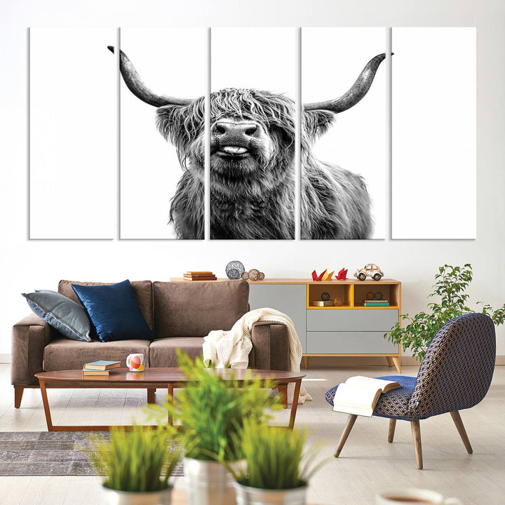 The Fanny Highland Cow art print decorates the modern kitchen, featured in black and white.