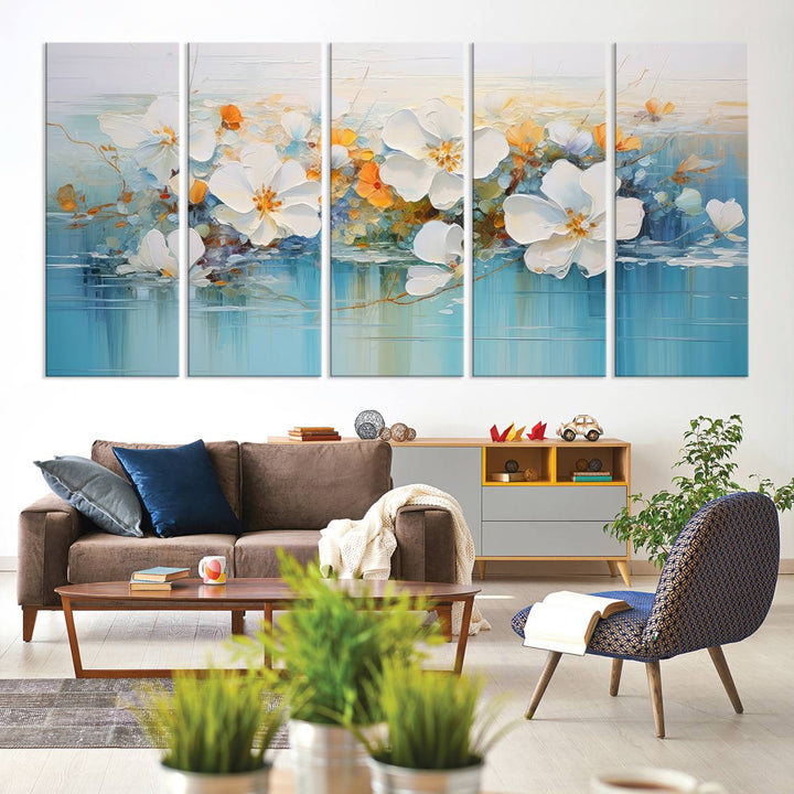 An Abstract Flower Wall Art Canvas Print in blue and orange hues.