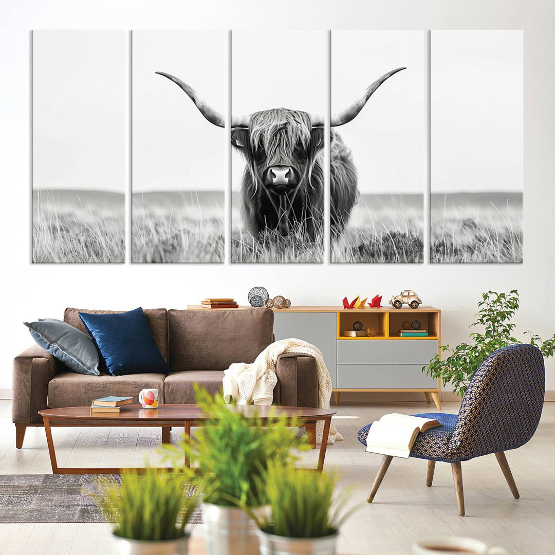 The Majestic Beauty canvas of a Highland cow adds elegance to the white walls as it hangs prominently.