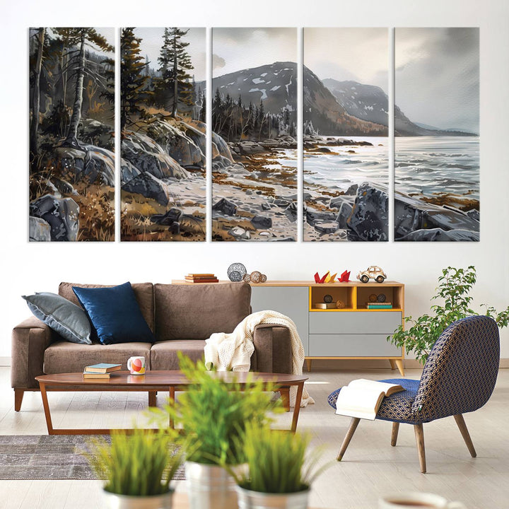 Framed wall art depicting Acadia National Parks rocky coast, trees, mountains, and sunlight over the sea; ready to hang.