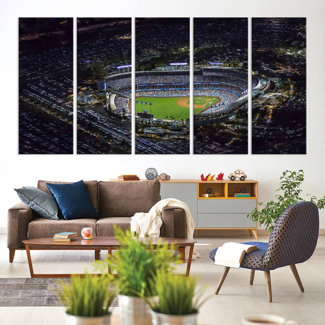 A large Los Angeles Dodgers print of Dodger Stadium at night is displayed near a window.