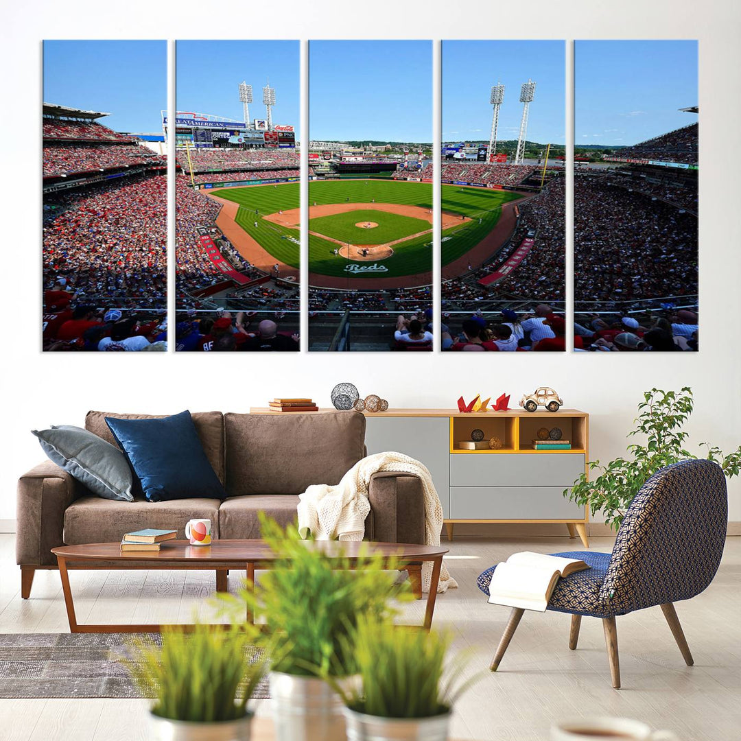 The Cincinnati Reds Baseball Team print of Great American Ball Park Stadium adorns the wall.