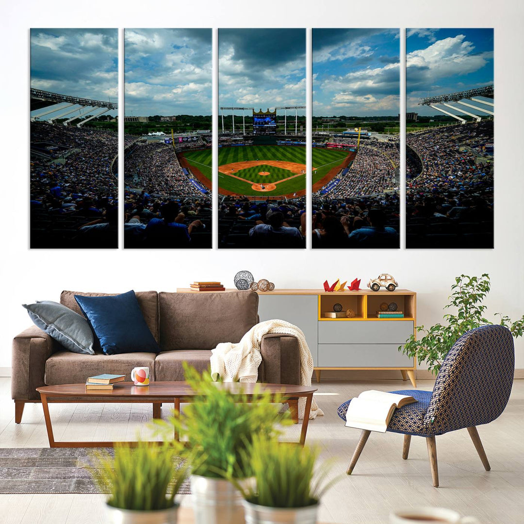 A 3-panel print of Kauffman Stadium, showcasing a crowded baseball field under cloudy skies.