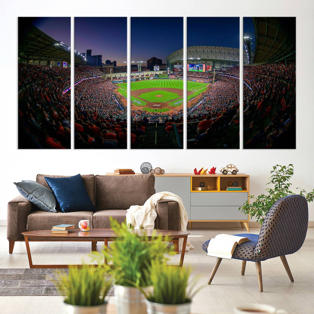 A canvas print of Houston Minute Maid Park at dusk is mounted on the wall.