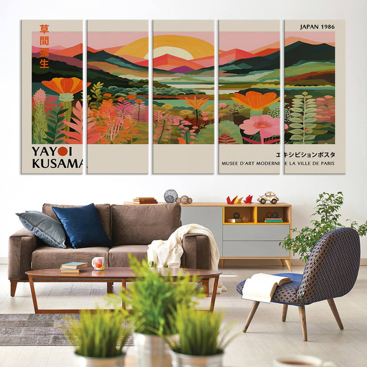 The Yayoi Kusama Landscape Canvas Print, featuring vibrant floral mountains and sunset scenery, enhances the room.