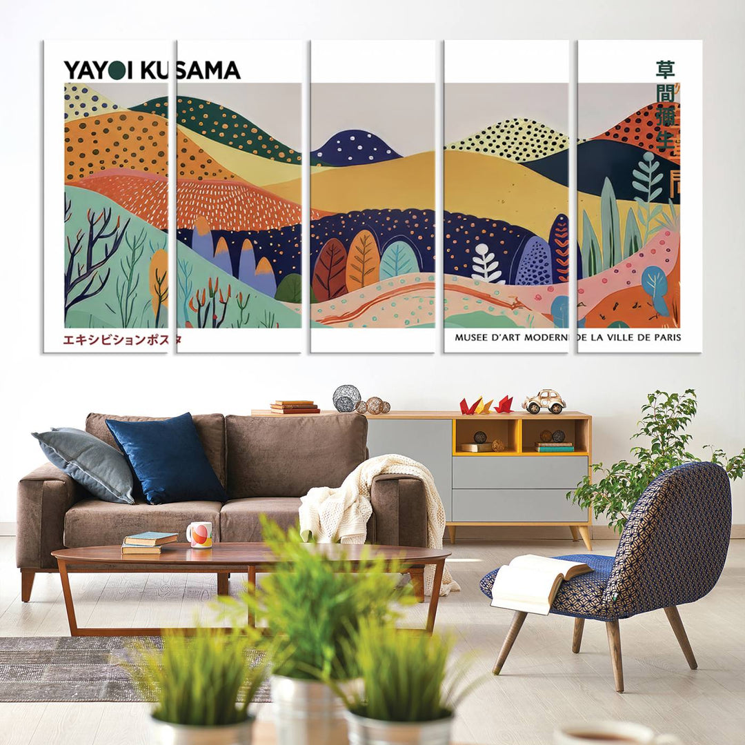 A triptych featuring the Framed Yayoi Kusama 1986 Wall Art Print hangs above. This Japanese Wabi Sabi inspired piece, rich in vibrant abstract landscapes, adds an elegant touch to any nature-inspired décor.