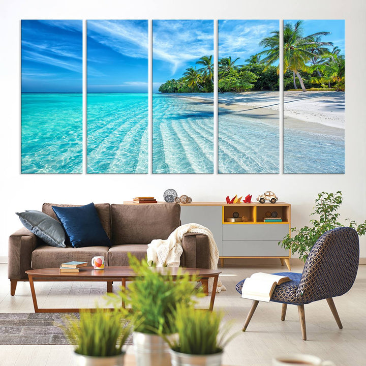 The Tropical Beach Wall Art Canvas Print showcases a serene ocean landscape with crystal clear turquoise water and palm trees, beautifully enhancing the coastal decor.