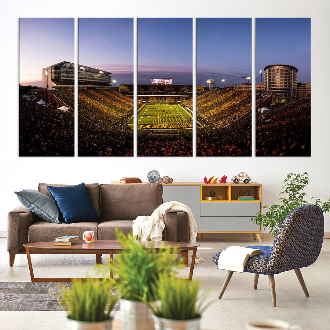 The Iowa Hawkeyes Kinnick Stadium Wall Art Canvas Print captures a sunset scene, making it perfect for display on a wall.