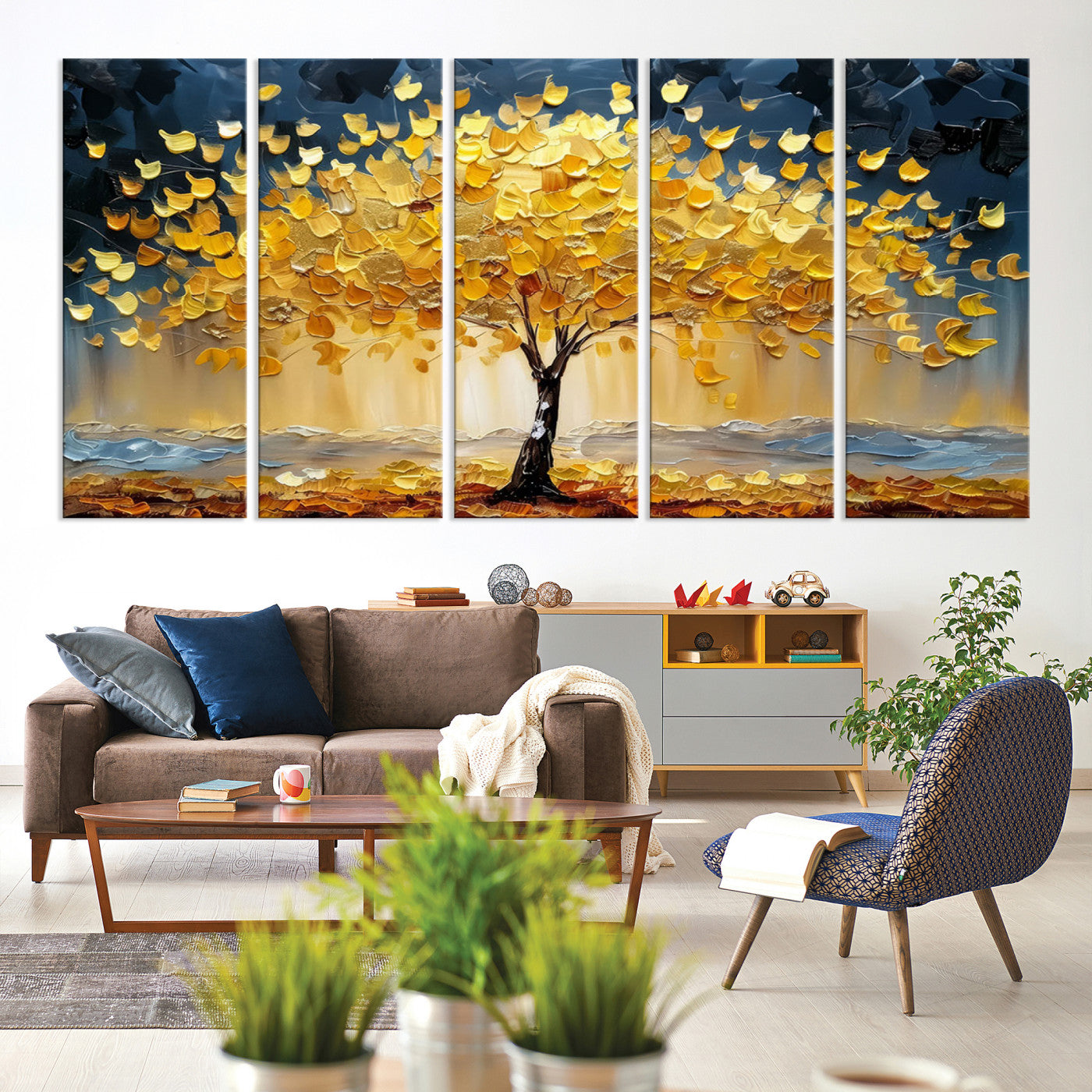 Canvas of a golden autumn tree with textured brushstrokes and moody blue skies, perfect for dramatic and vibrant home decor.