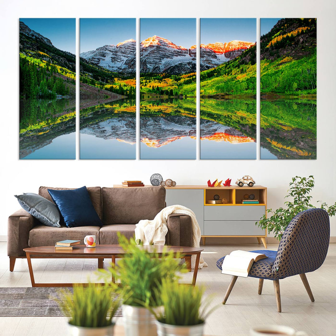 The Sunrise Maroon Bells Lake Wall Art Print beautifully captures North Maroon Peak mirrored in the tranquil lake, framed by lush greenery.