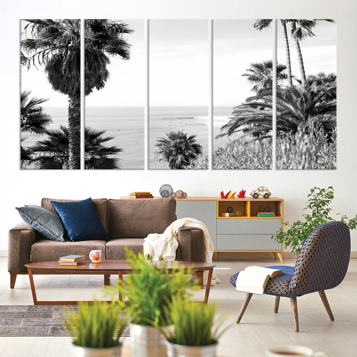 Monochrome canvas of palm trees framing a coastal surf scene, perfect for California-inspired or retro black-and-white beach decor.