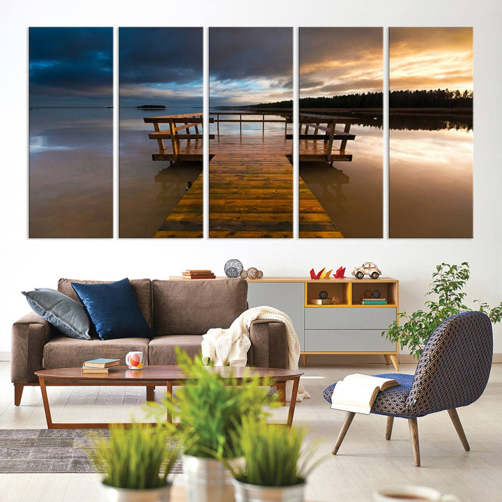 The "Serene Lake Pier at Sunset" landscape canvas print, crafted as ready-to-hang and framed wall art, enriches the contemporary setting by capturing the tranquility of a lakeside pier at sunset.