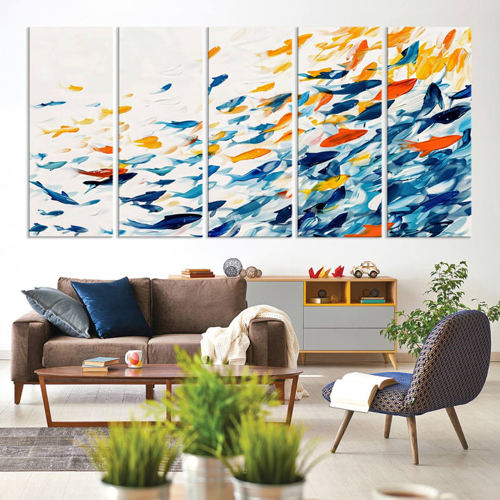 A colorful Abstract Fish Shoal Canvas Print hangs on the wall.