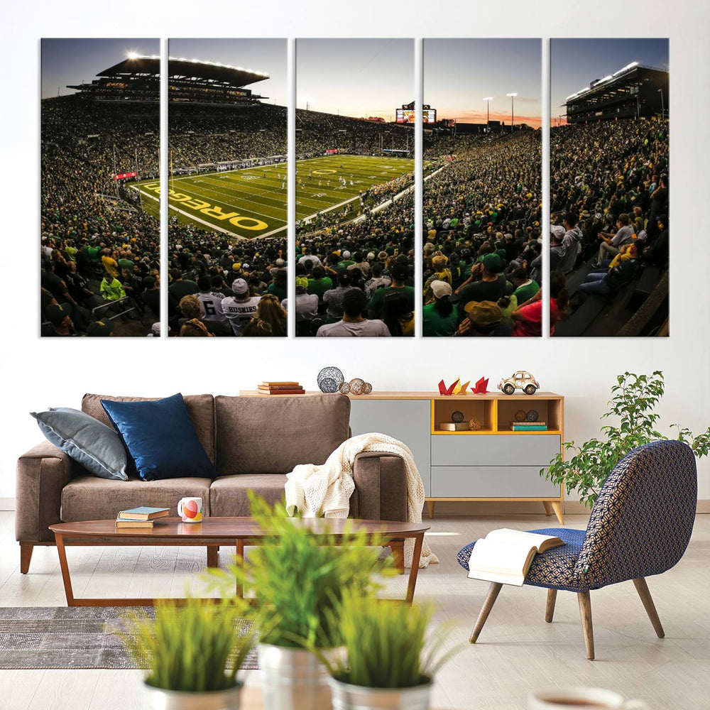 The Oregon Stadium Canvas Wall Art features a depiction of a packed Autzen Stadium with OREGON prominently displayed on the field.