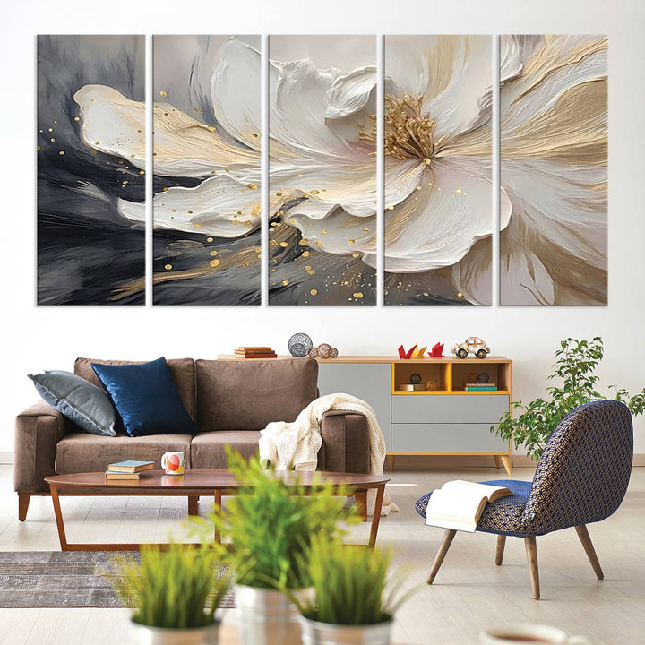 The abstract floral wall art canvas print features a large flower with gold accents.