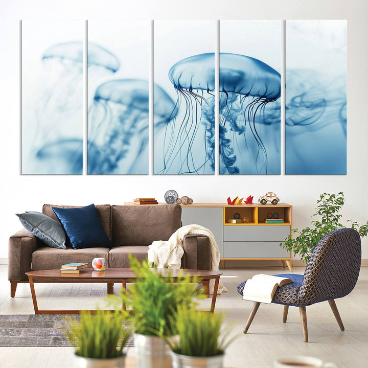 A breathtaking triptych of the Blue Jellyfish Wall Art Canvas Print decorates the space, beautifully highlighted by an overhead lamp. Each canvas is created on museum-quality material using high-resolution printing and includes a UV-protective coating to ensure long-lasting vibrancy.