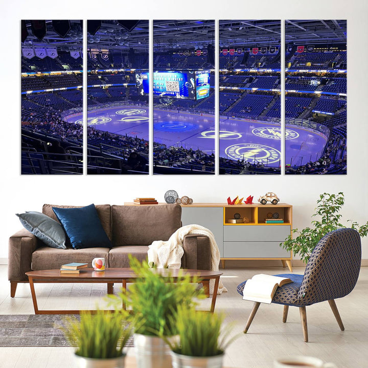 The wall art canvas print at Amalie Arena features team logos on ice, encapsulating the vibrant atmosphere of an NHL hockey stadium.