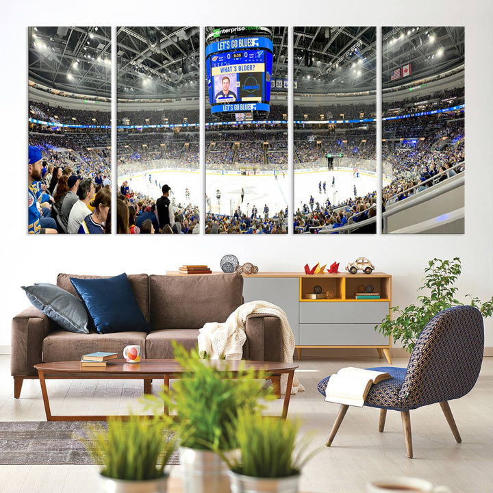 Wall art prints depicting the bustling scenes of the St. Louis Blues being cheered on by a full house at the Enterprise Center, beneath a large scoreboard.