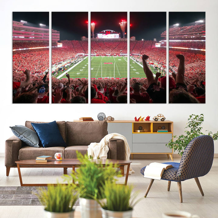 The University of Nebraska Cornhuskers Football Team Print, a vibrant three-panel canvas depicting Lincoln Memorial Stadium filled with enthusiastic fans from the end zone perspective, features a gallery-quality finish.