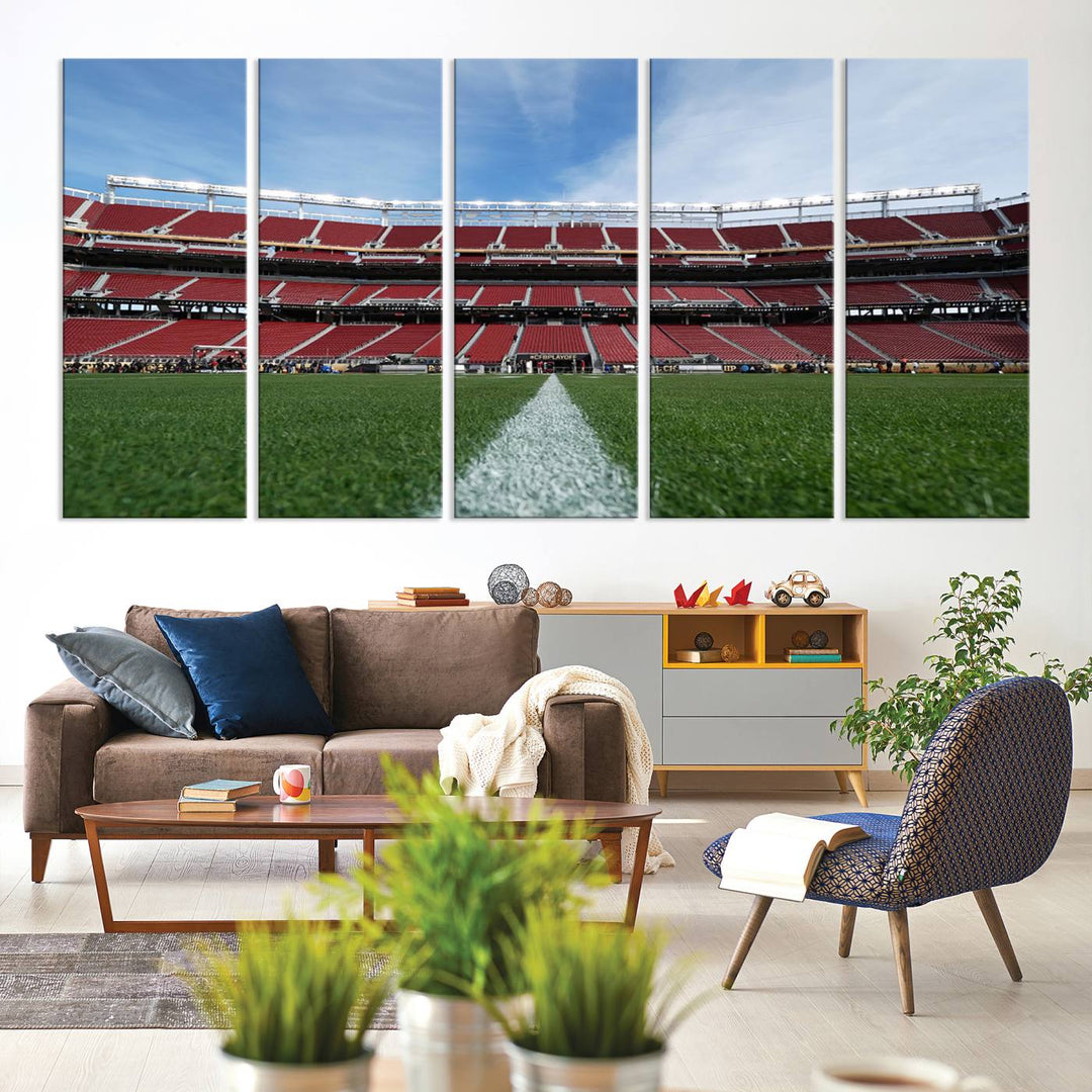 A canvas print of the University of Tulsa Golden Hurricane showcases H.A. Chapman Stadiums football field and red seats against a backdrop of a blue sky.