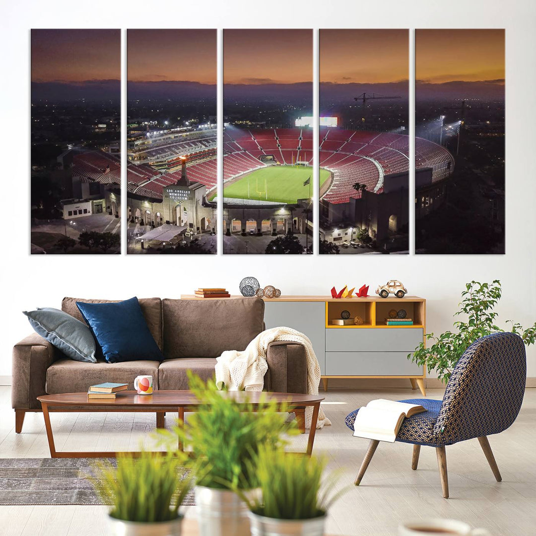 The USC Trojans Stadium canvas captures Memorial Coliseum at twilight, showcasing red seats and a green field beneath an orange sky.