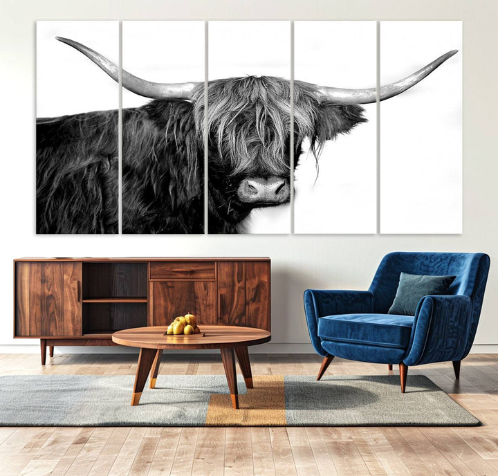 The Black and White Highland Cow Multi Panel Wall Art Canvas Print with UV-protection hangs prominently.