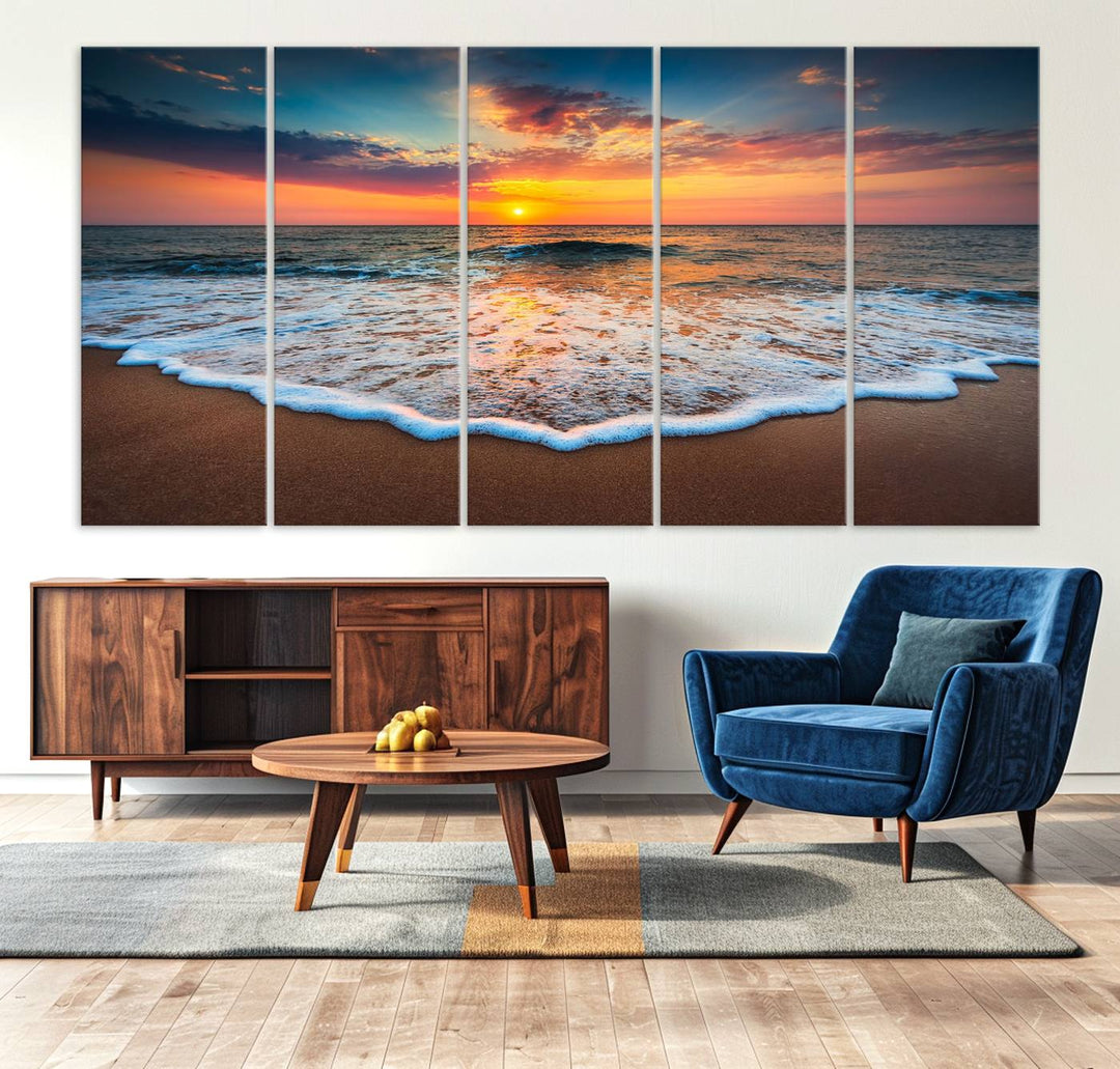 A Sunset with Calm Waves on the Beach Wall Art Canvas Print adorns the dining room.