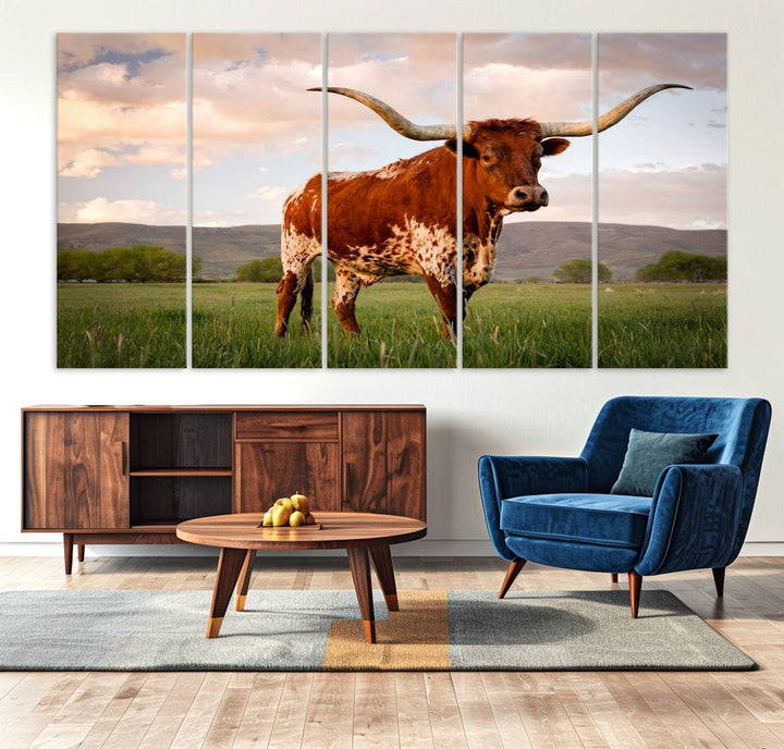 The Texas Cow Canvas Wall Art print captures a longhorn cow at sunset and is ready to hang.