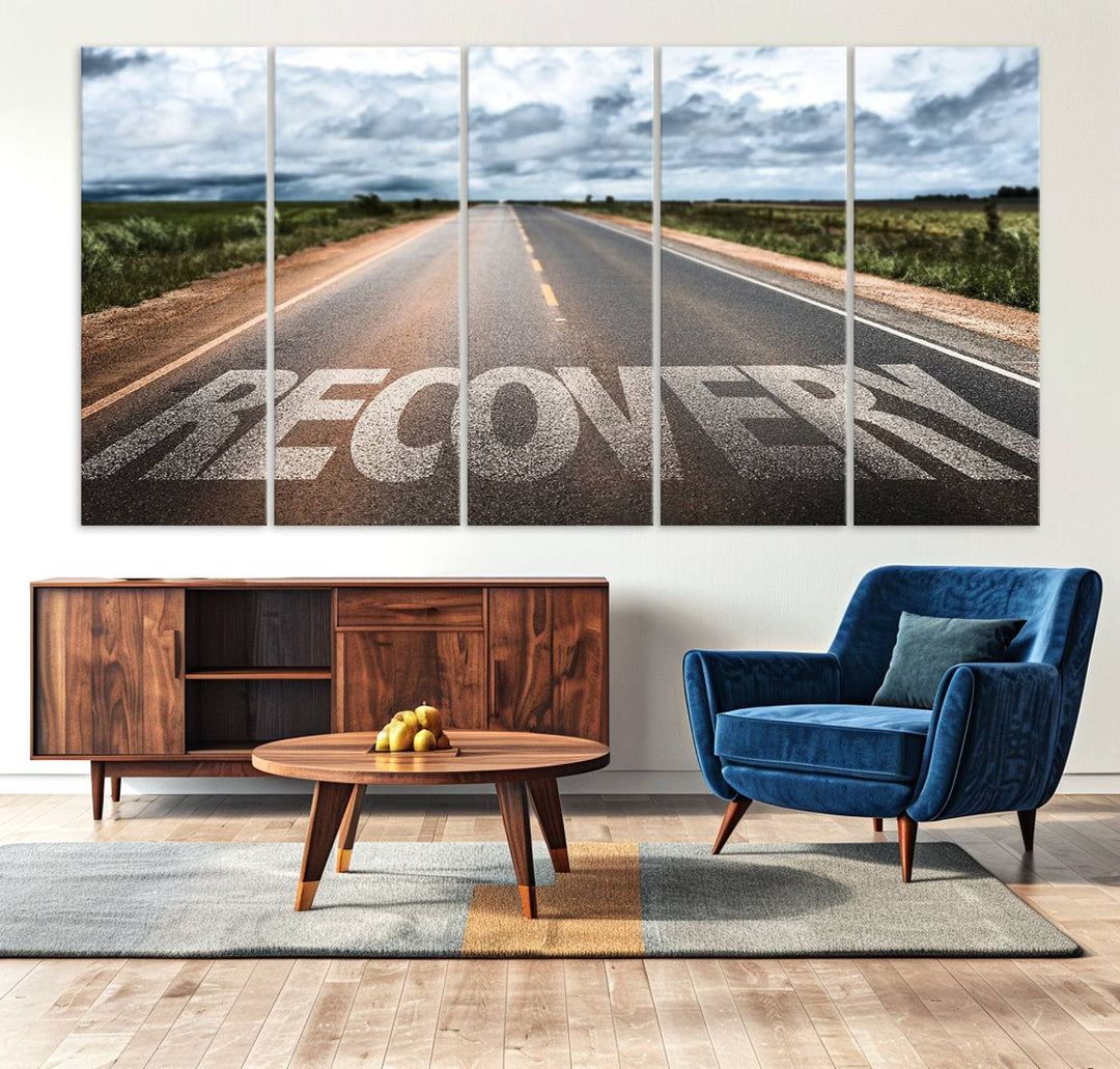 The Recovery Road Wall Art Canvas Print depicts a road under a cloudy horizon.