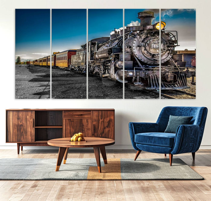 The Train Wall Art Canvas Print features a vintage steam train with a bright headlight.