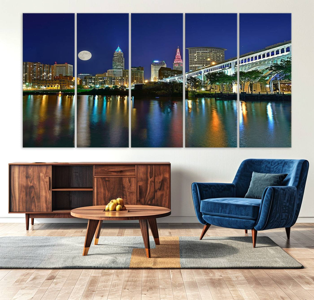 Cleveland City Lights Night Skyline Wall Art canvas showcases a moonlit cityscape reflected on water.