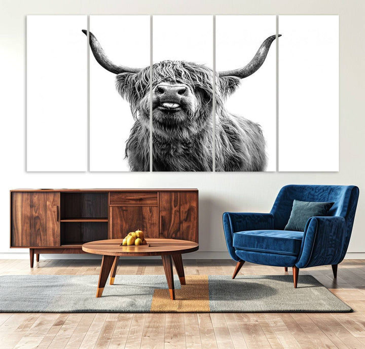 The Fanny Highland Cow art print decorates the modern kitchen, featured in black and white.