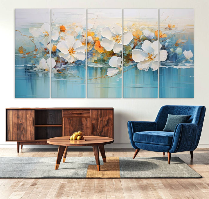 An Abstract Flower Wall Art Canvas Print in blue and orange hues.