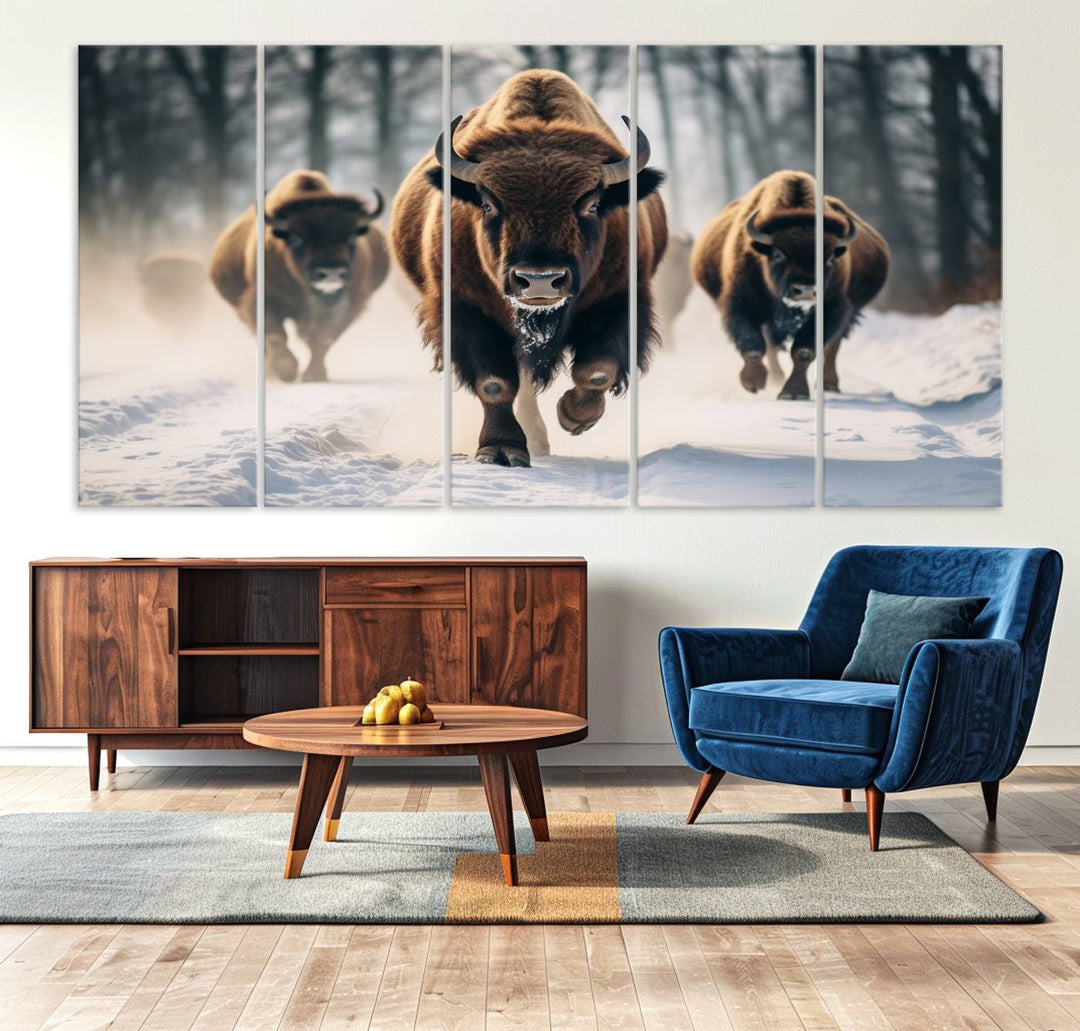 Wall art titled Cow Bighorn shows three bison running through snow in a forest.