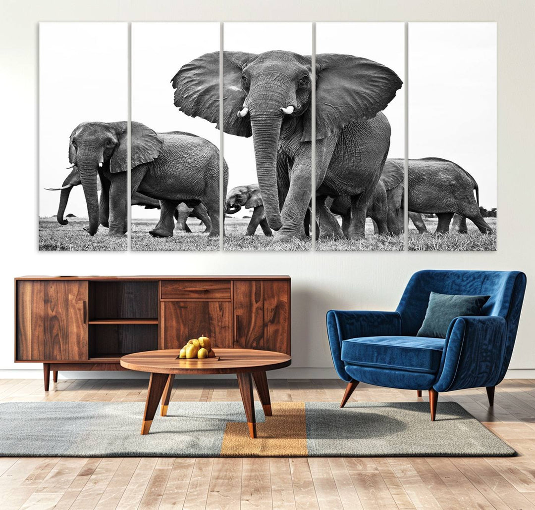 A modern dining area features a Black White Elephant Family Wall Art Canvas Print.