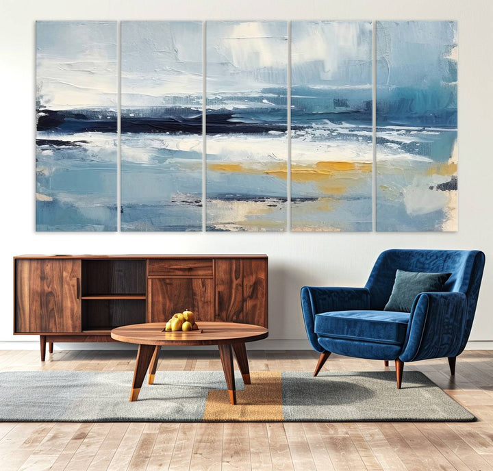 The Abstract Ocean Canvas Wall Art in coastal blue and gold enhances the modern kitchen.