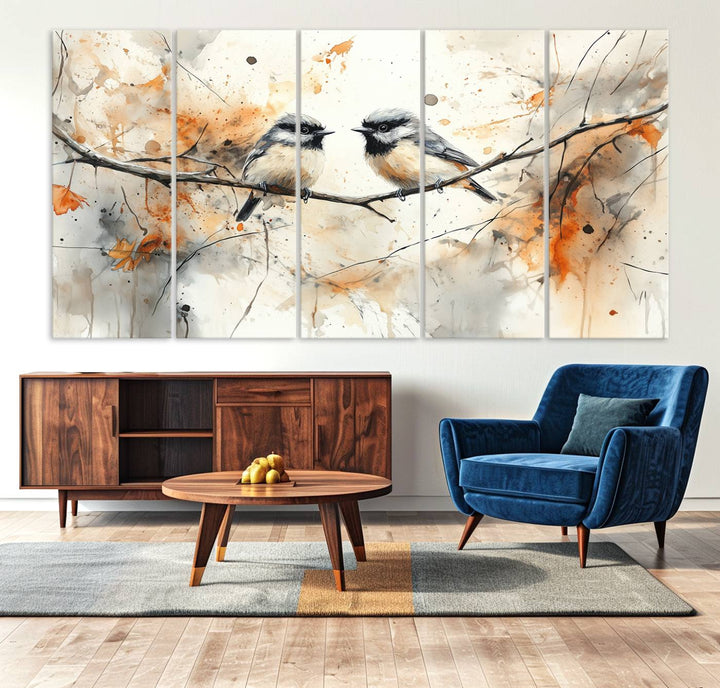 The living room features abstract watercolor chickadee bird art on the wall.