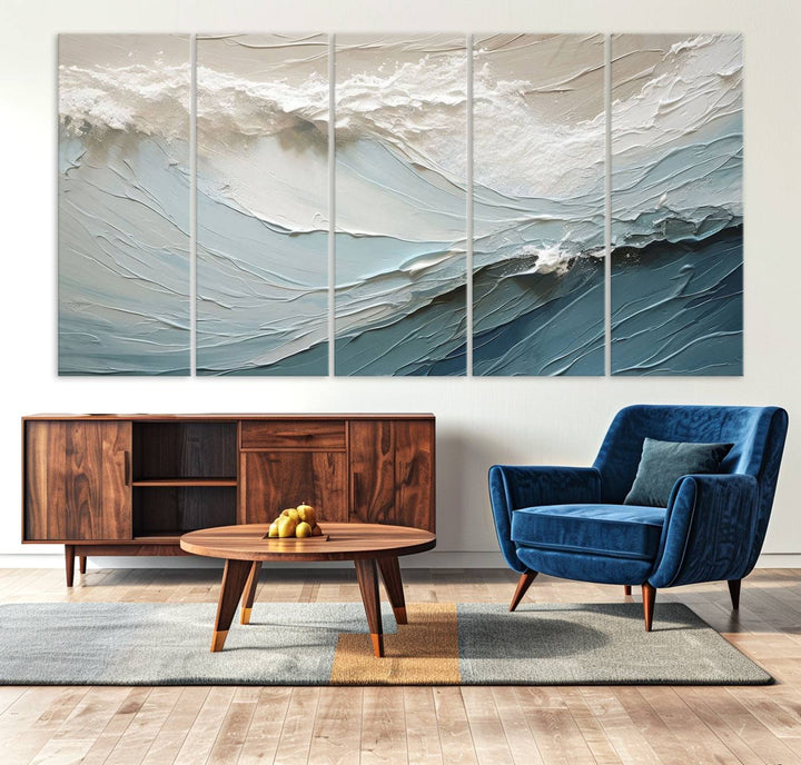 The Waves Abstract Wall Art Print, a captivating piece of modern framed abstract canvas, beautifully decorates the wall. This abstract painting is designed to enhance your living room decor and offers the convenience of being ready to hang.