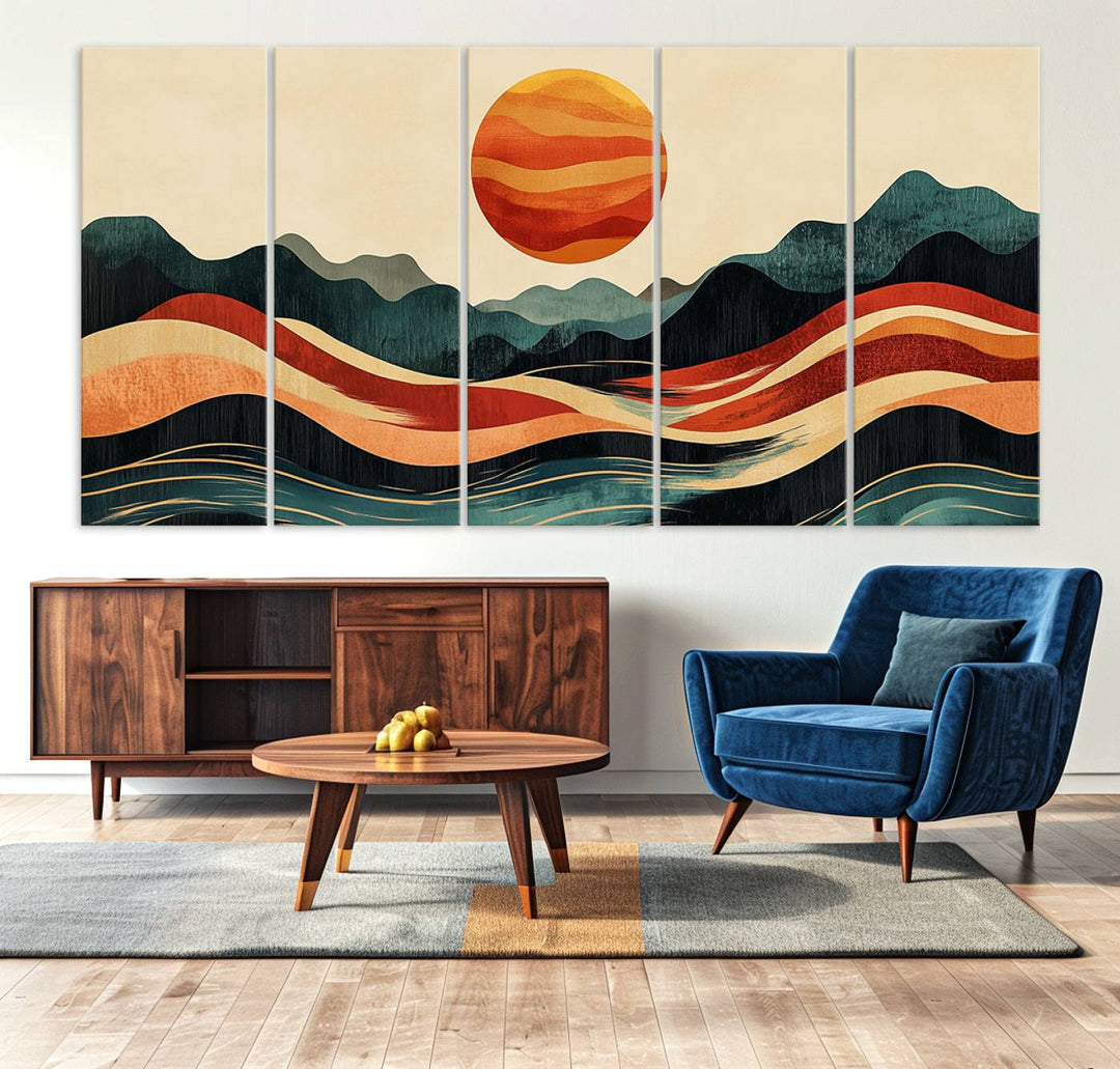 The Mountain Triptych wall art, featuring a design of the sun, mountains, and waves, is displayed prominently on the wall.