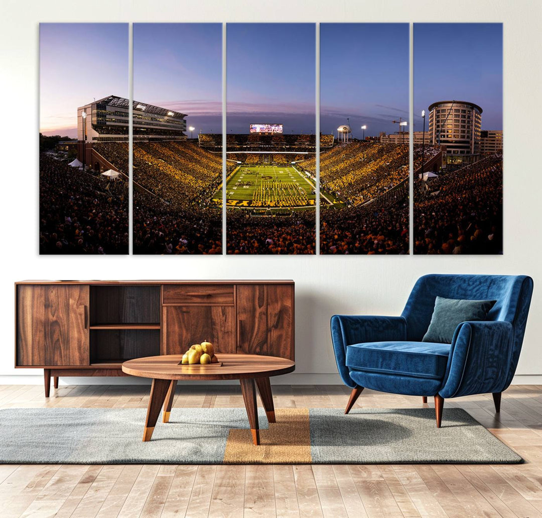 The Iowa Hawkeyes Kinnick Stadium Wall Art Canvas Print captures a sunset scene, making it perfect for display on a wall.