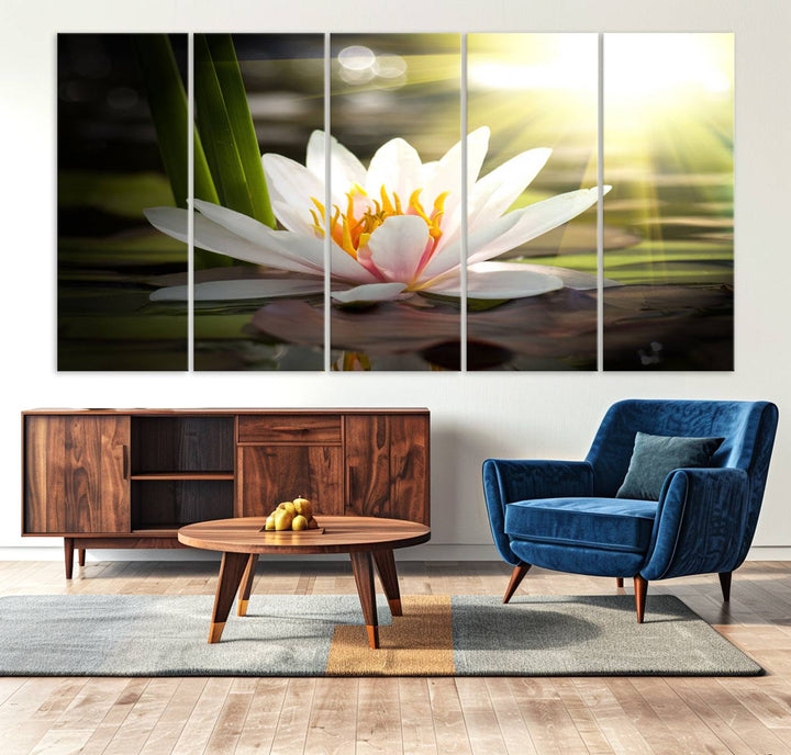 The Lotus Flower Wall Art Canvas Print showcases a white water lily with a yellow center floating gracefully in sunlight.