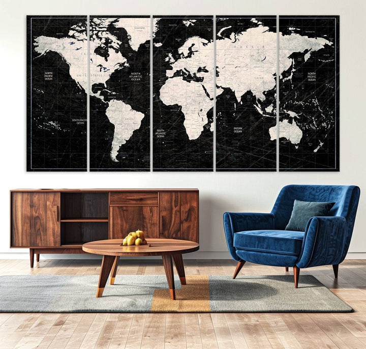 A bold global style framed black and white world map canvas print, presented in three panels, perfect for modern home or office decor.